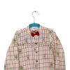 red bow green shirt